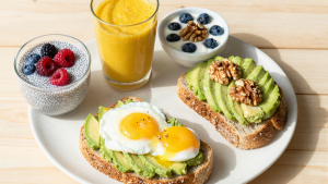 Colorful anti-inflammatory breakfast spread with chia pudding and avocado toast